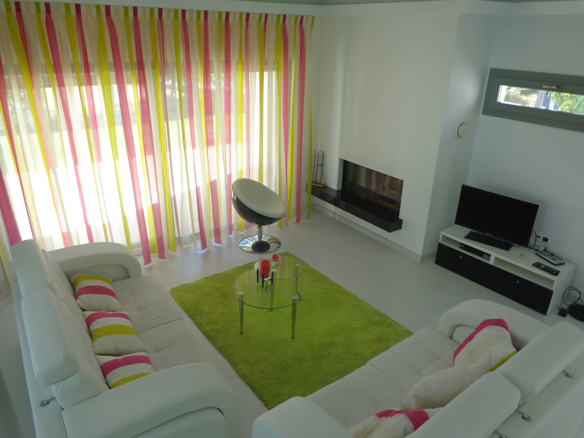 Bright living room with colorful curtains