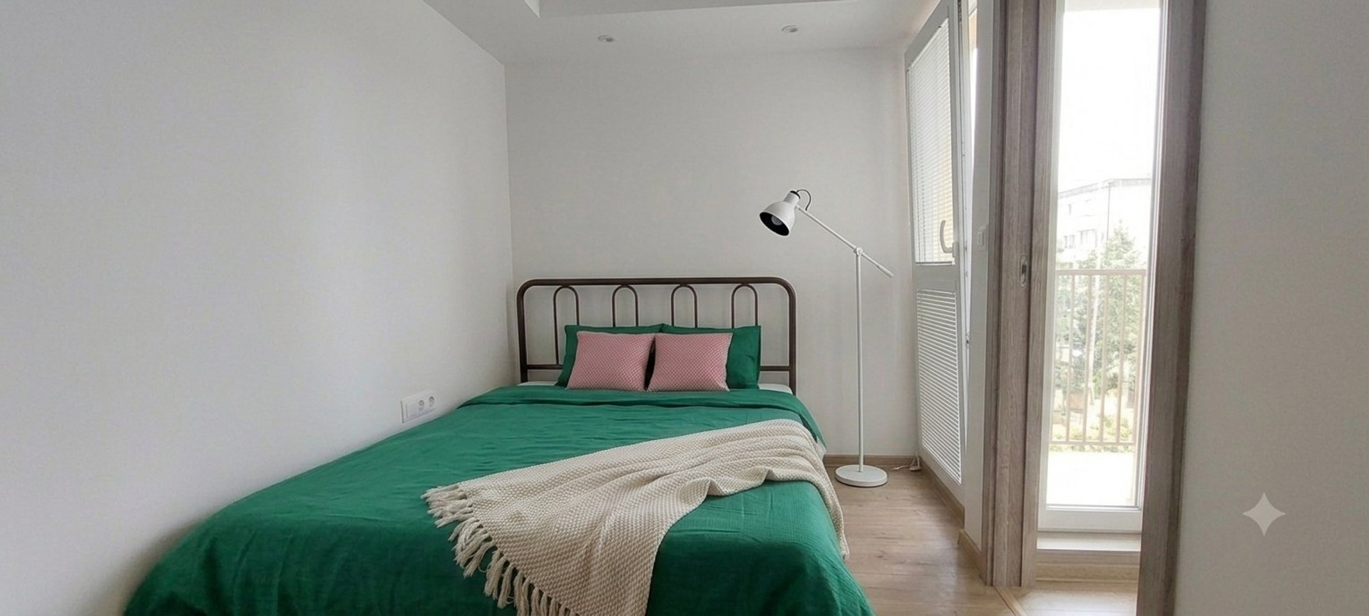 Bedroom with green bedding