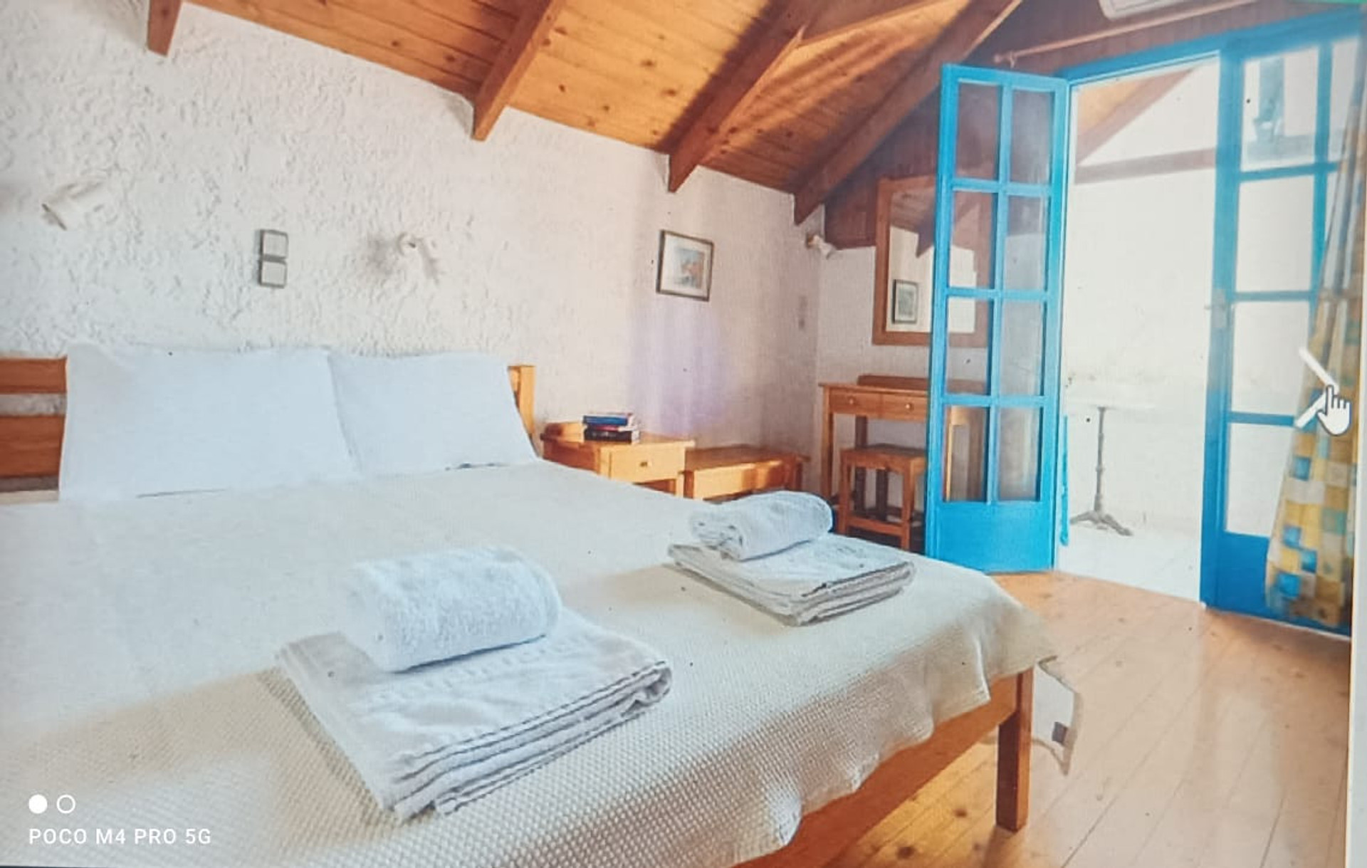 bedroom upstairs ,balkony with view to the sea