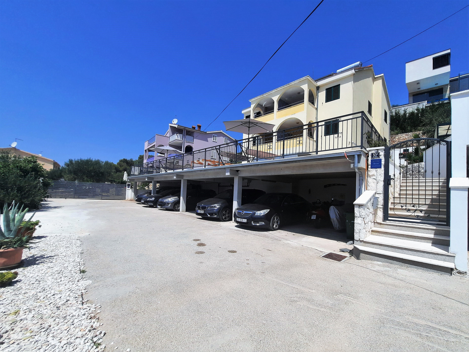 main entrance, parking lot and property