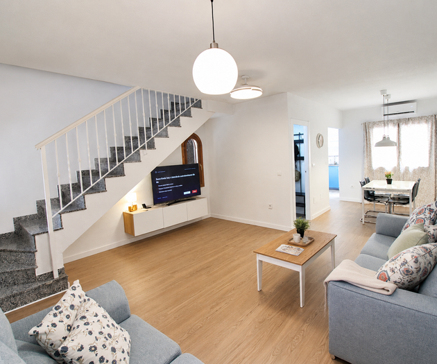 Living room with staircase view