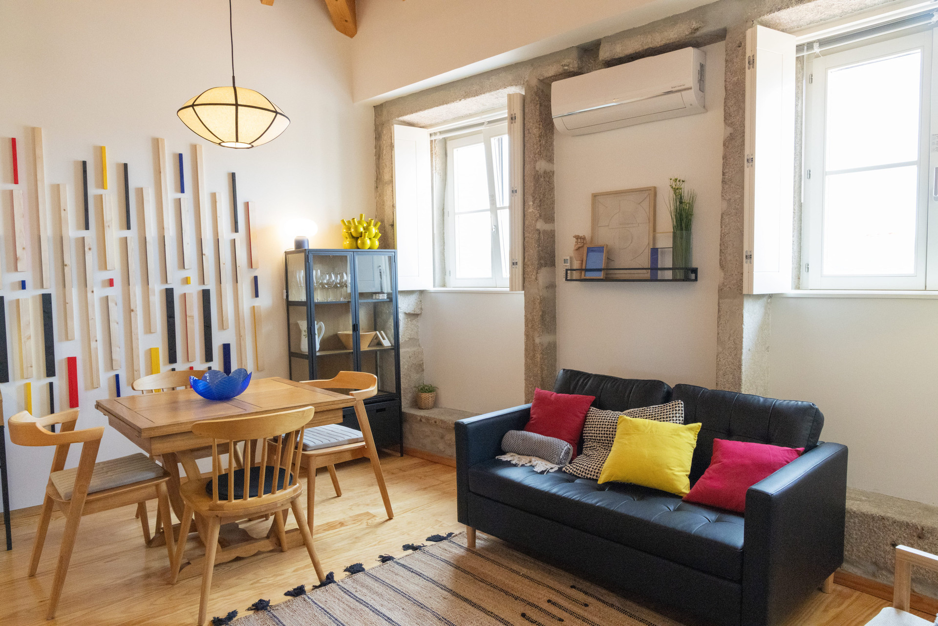 Living and dining area with sofa