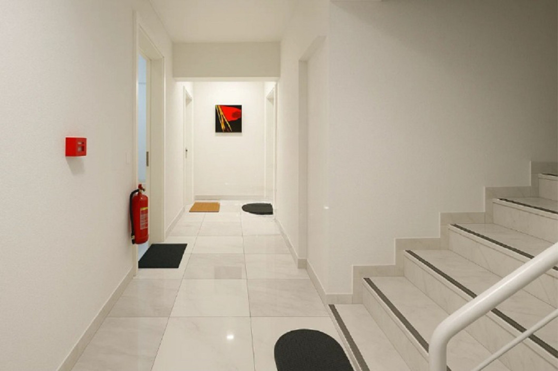 Clean and well-maintained building entrance and common areas for a safe and welcoming arrival