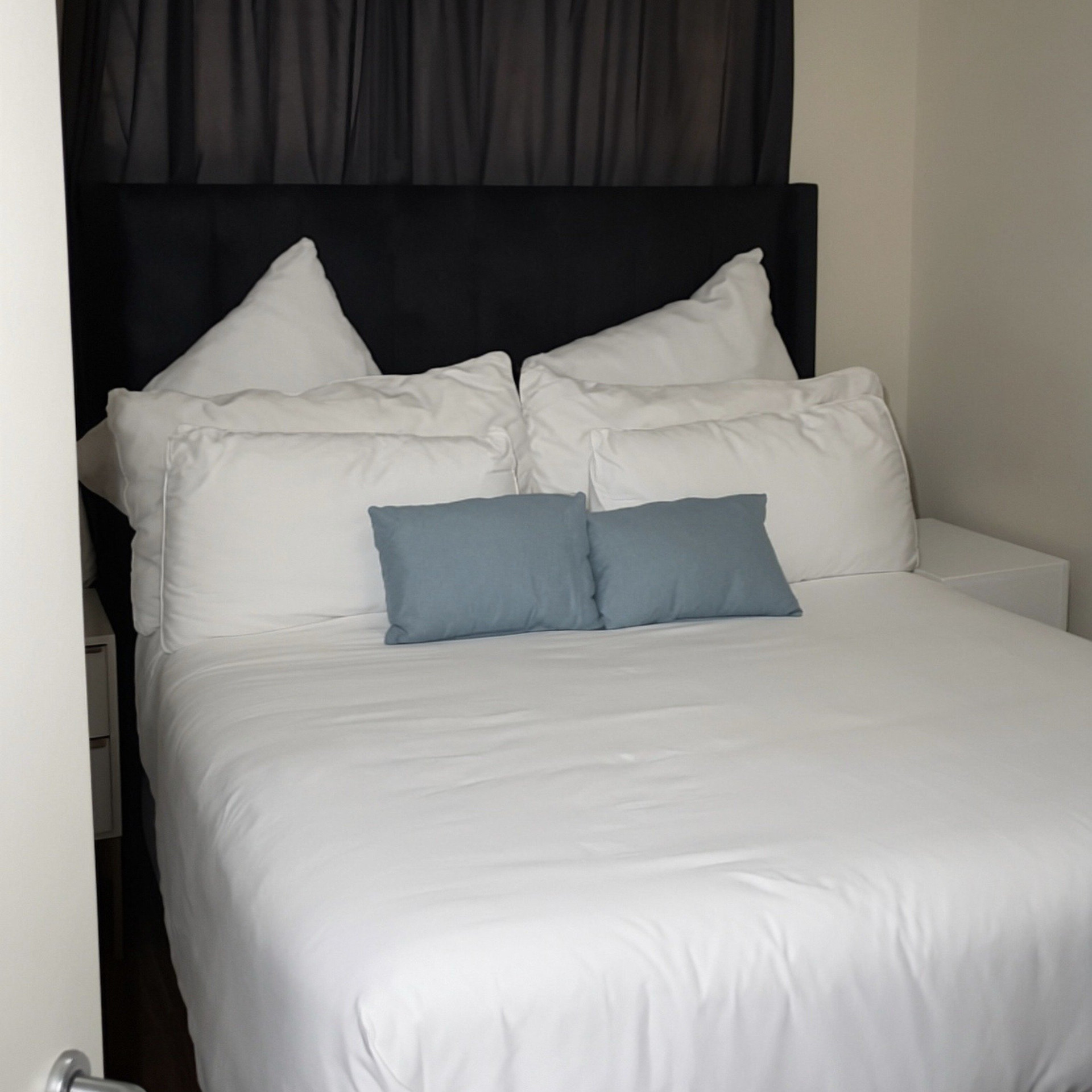 Cozy bedroom with white bedding