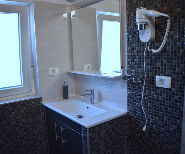 Modern bathroom sink and hairdryer