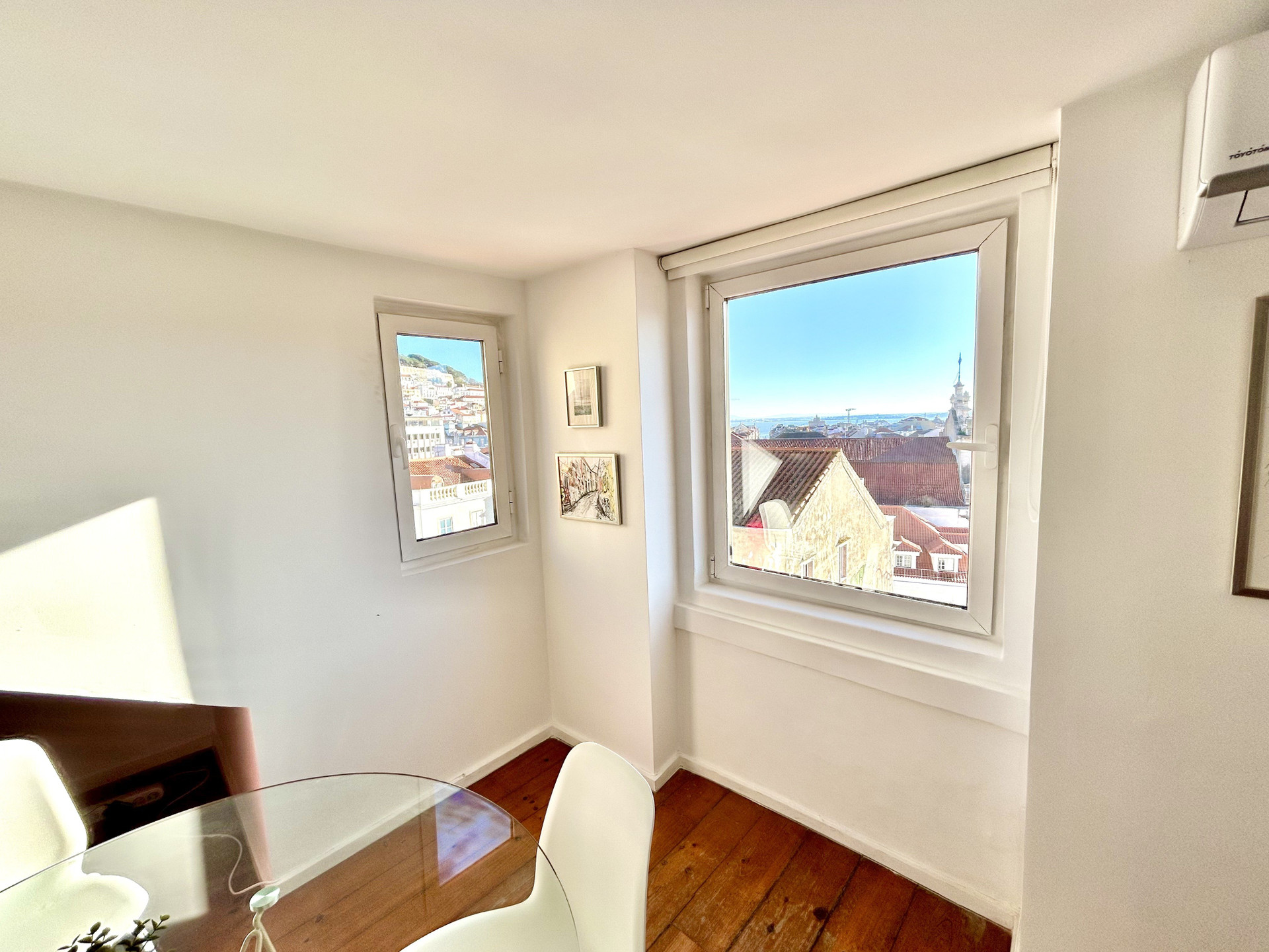 Dining area with city rooftop views
