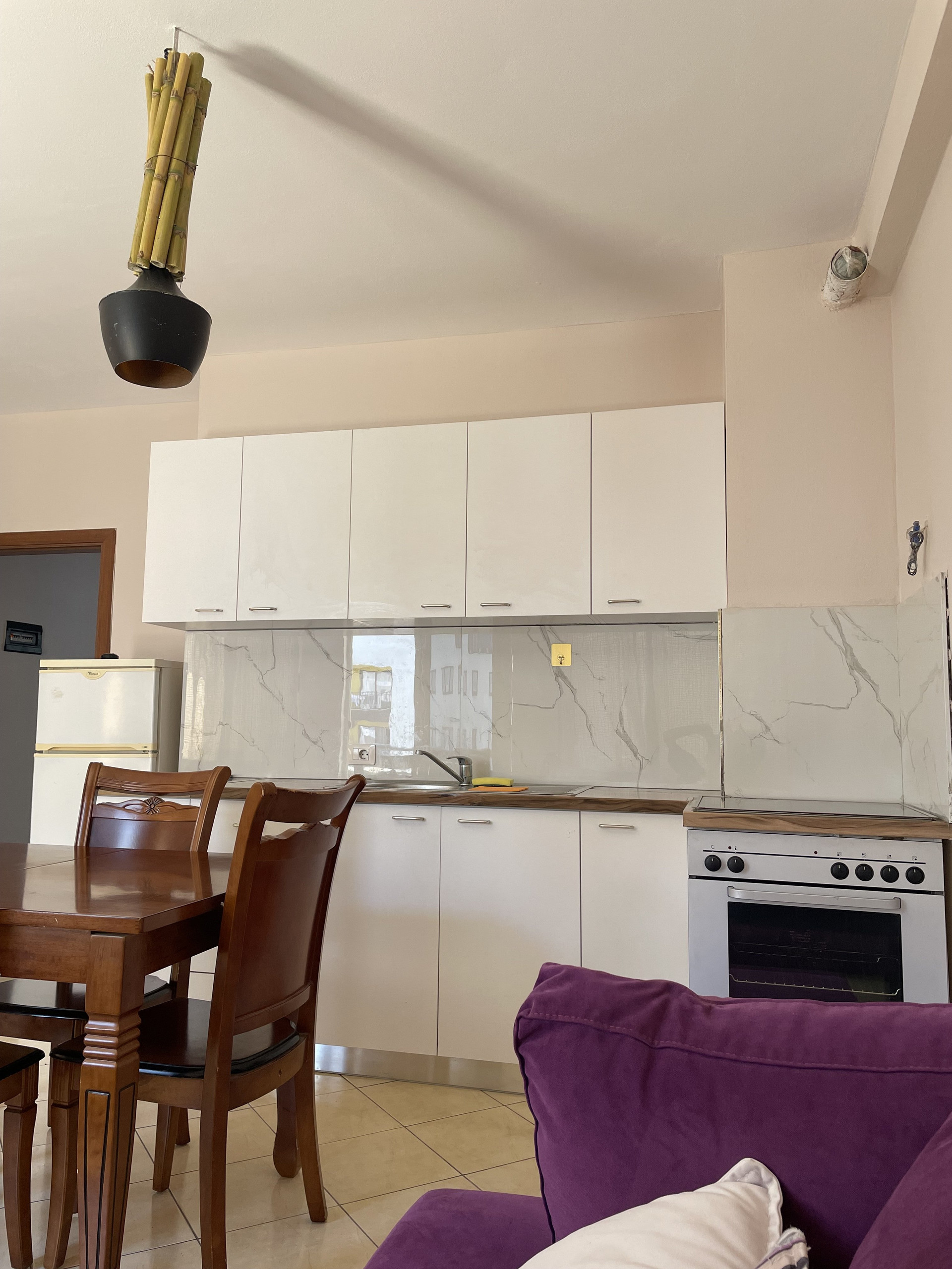 Kitchen white cabinets marble backsplash
