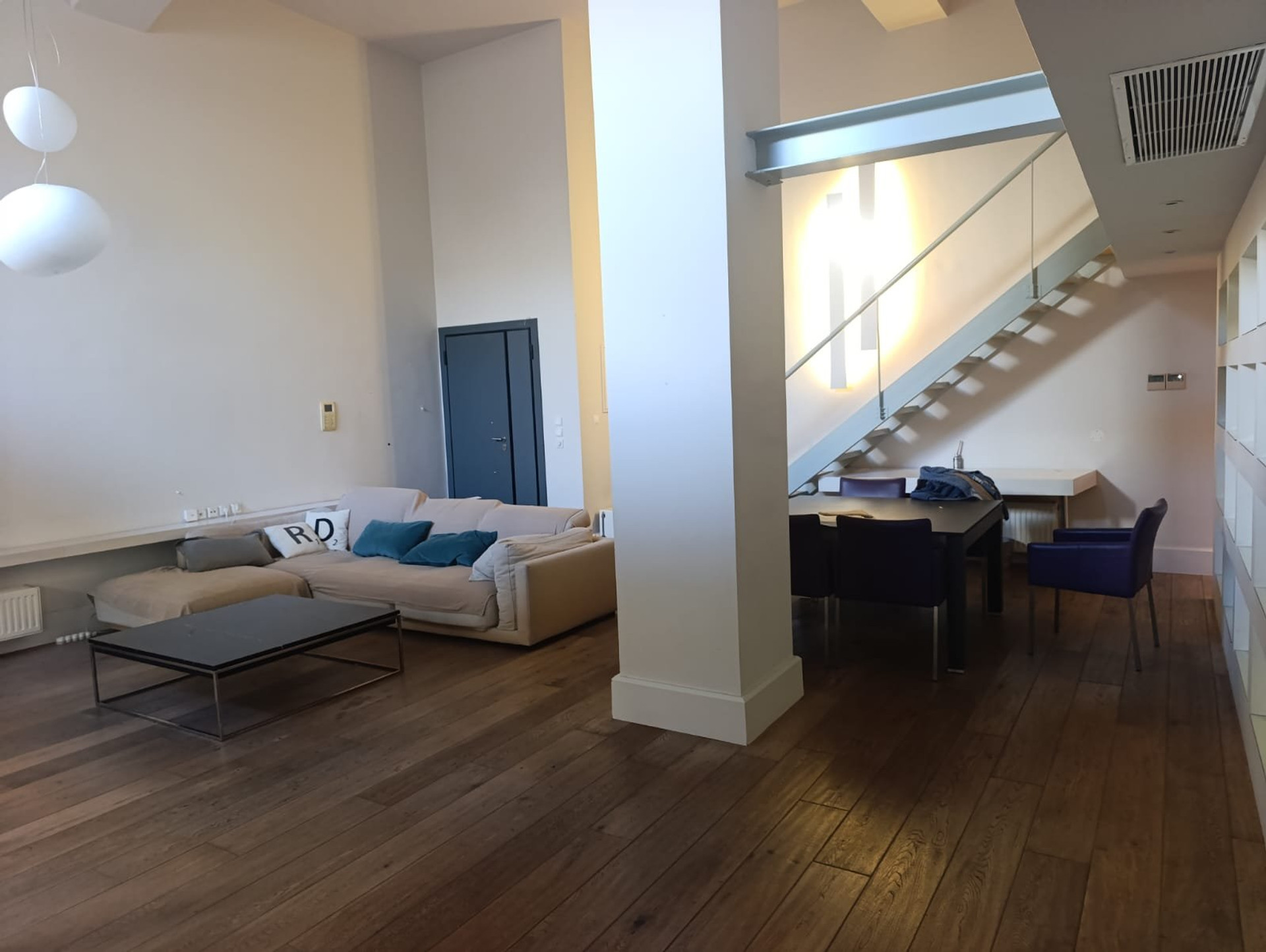 Living room with sofa and stairs