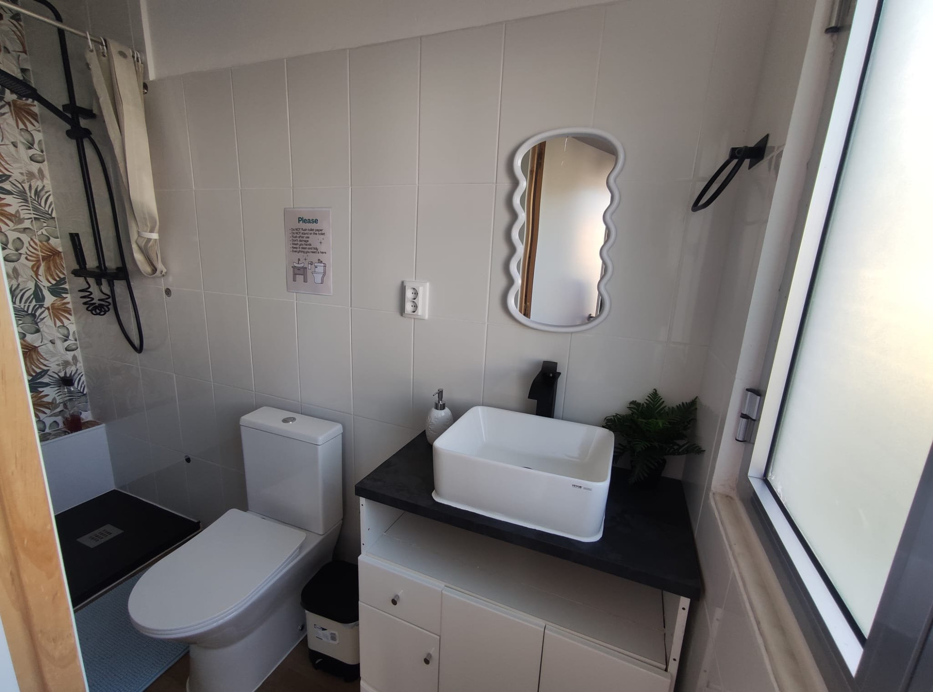 Bathroom with sink and toilet