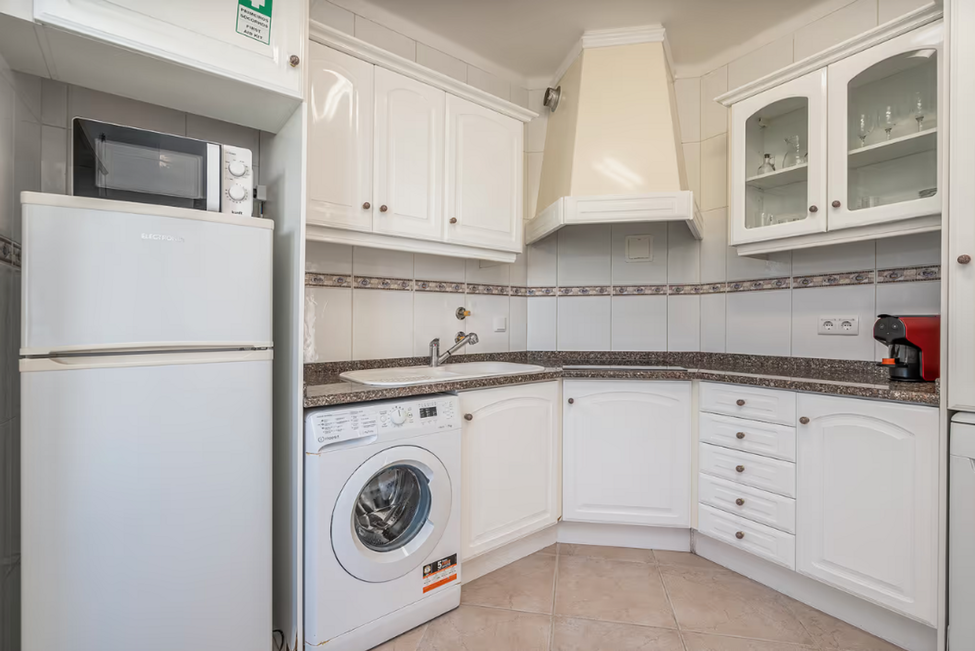 White kitchen corner with appliances