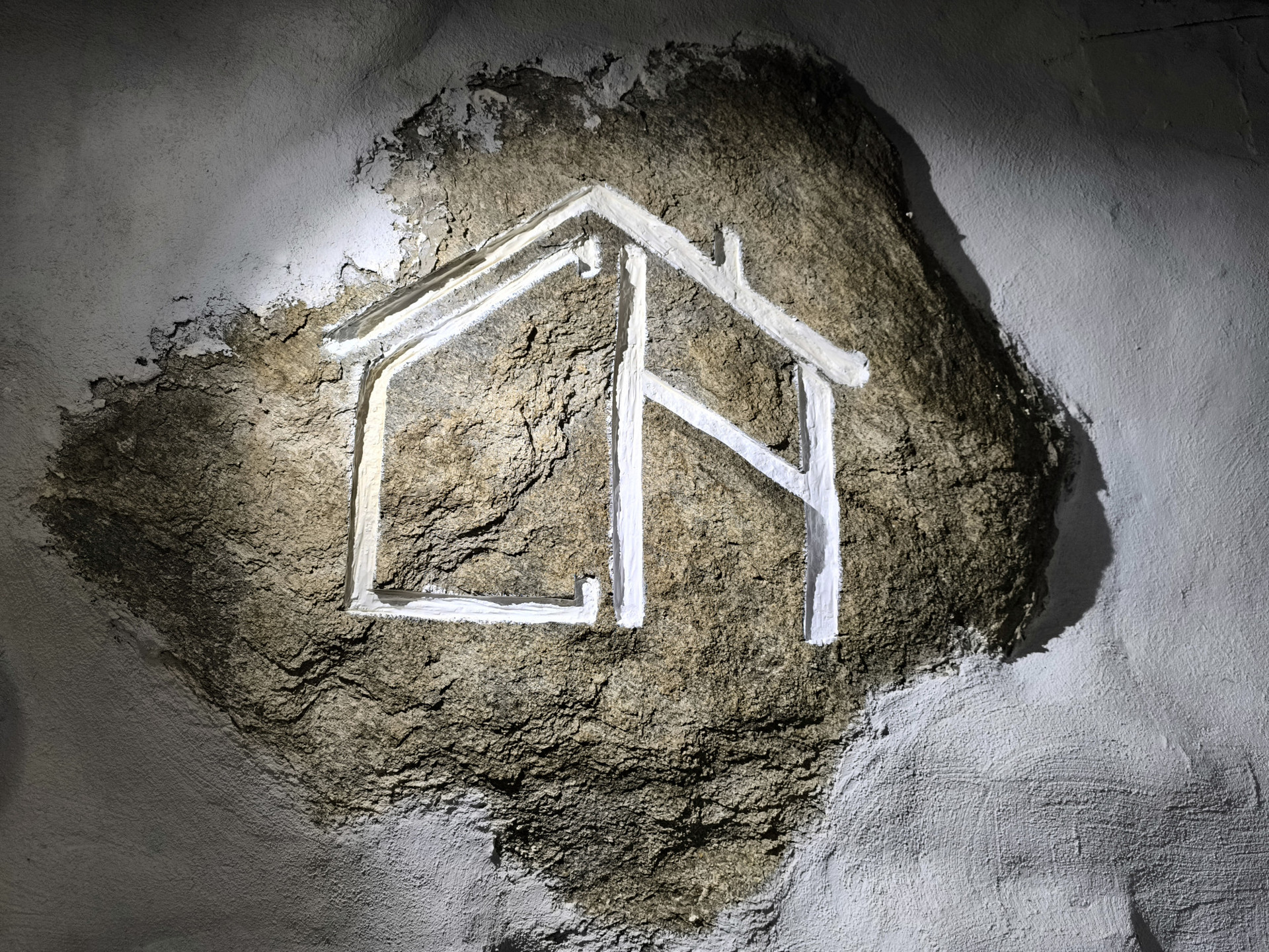 Logo in a rock at the Terrace space