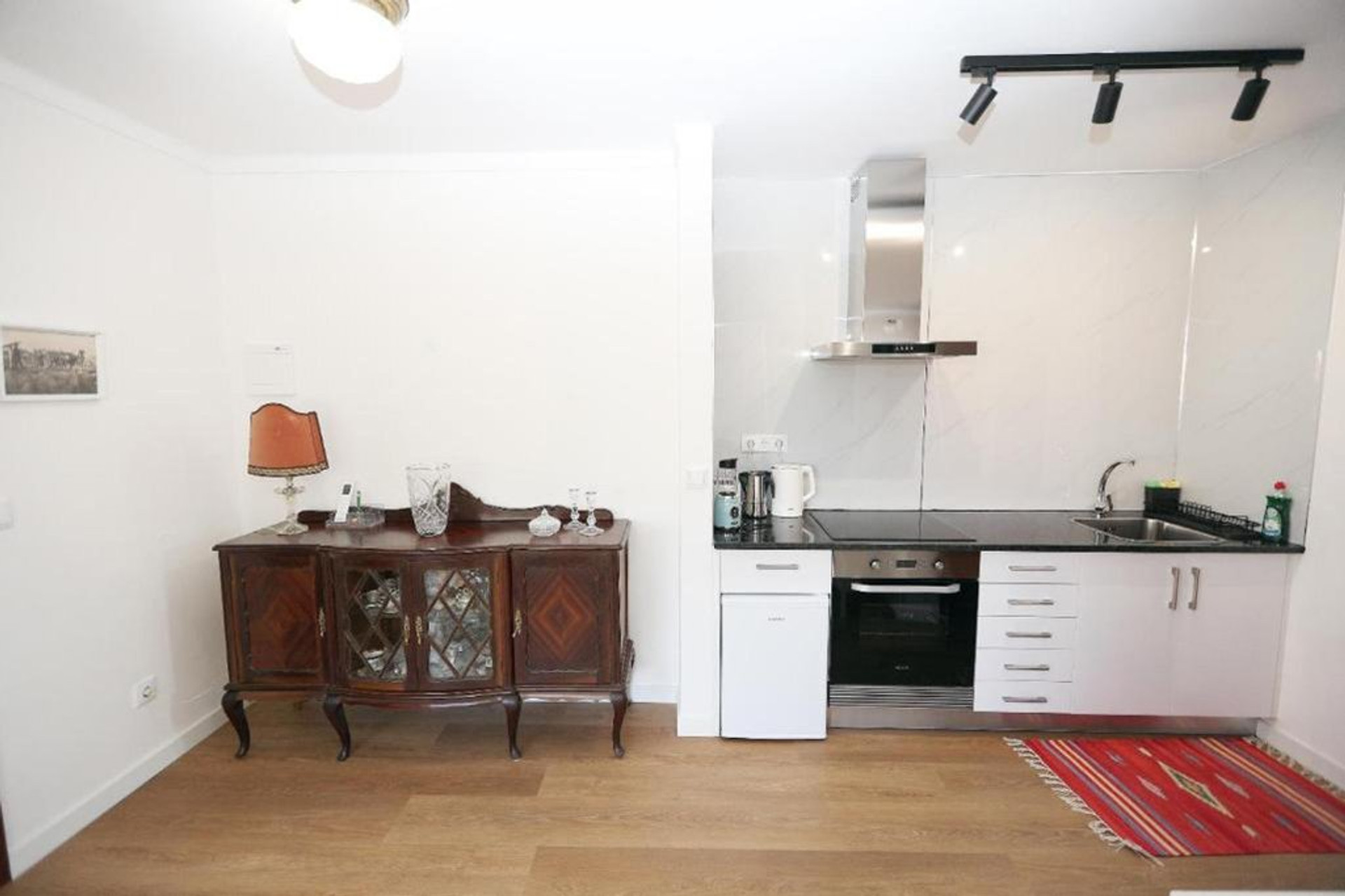 Compact kitchen with dining sideboard