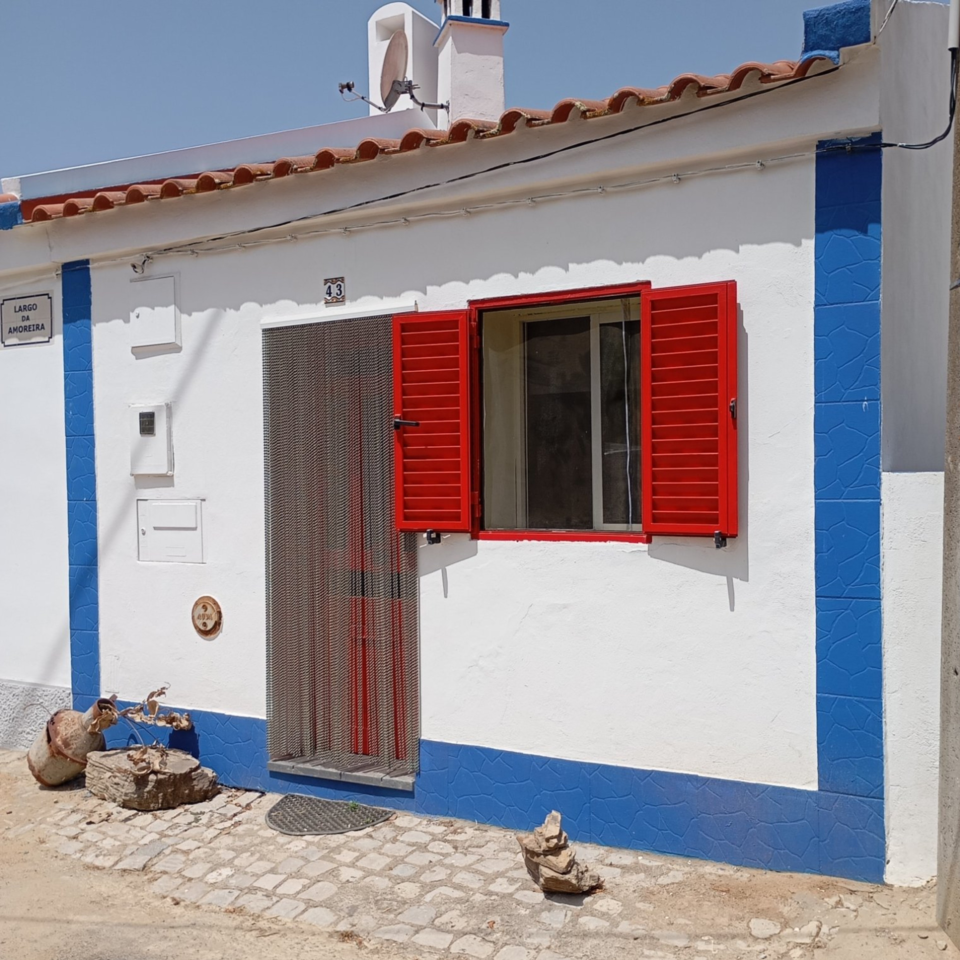 House exterior with red shutters