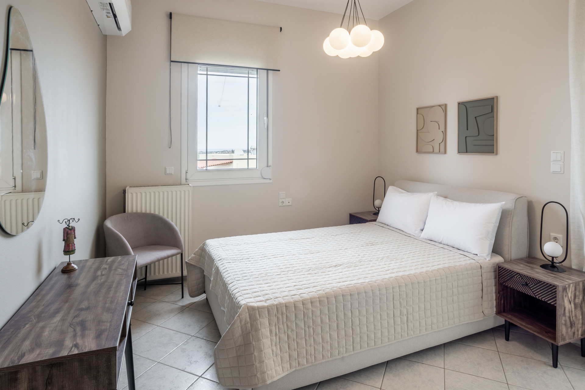 Clean, comfortable double bedroom with quality bedding and contemporary style