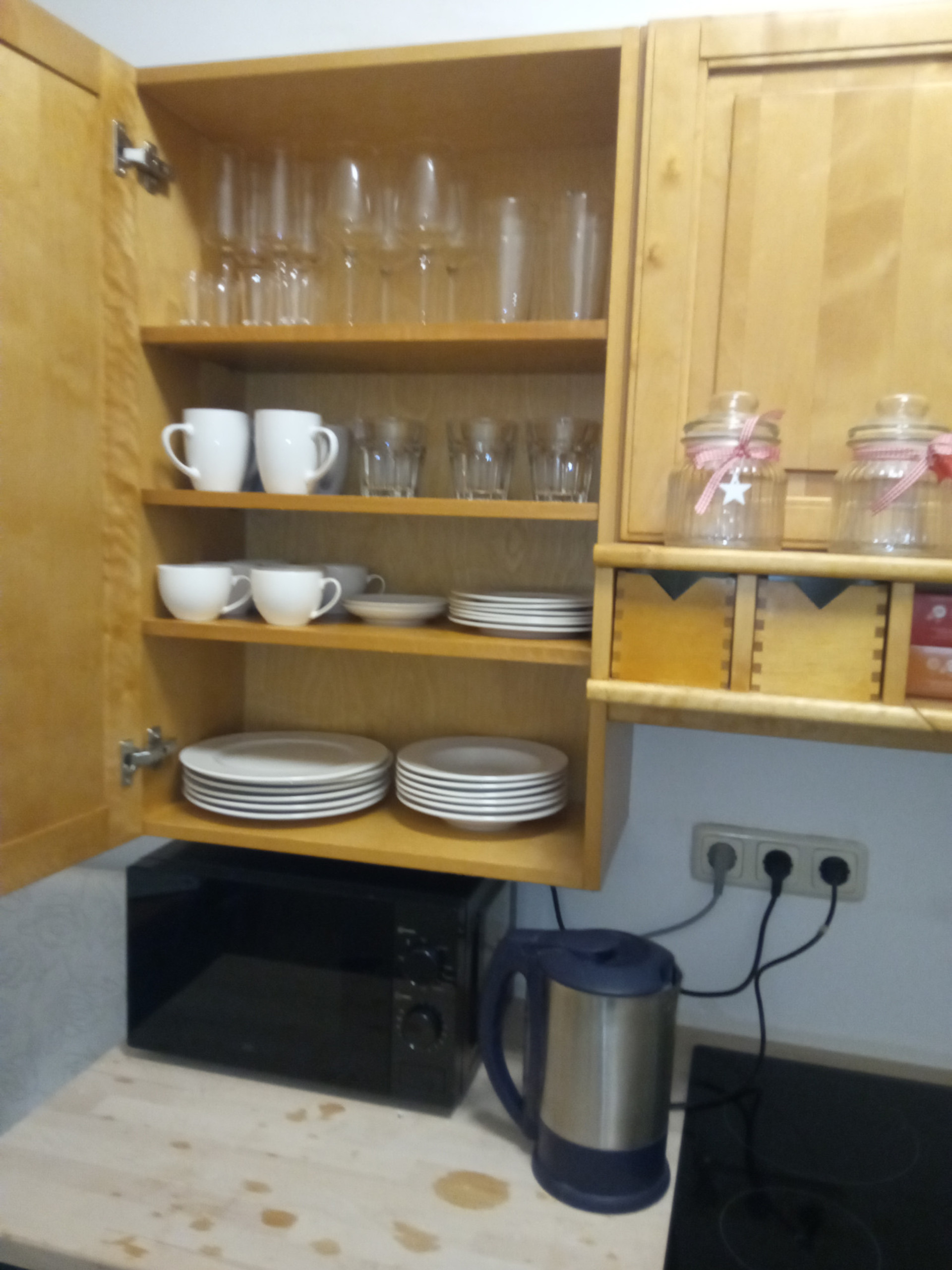 kitchen provides plenty plates & glases