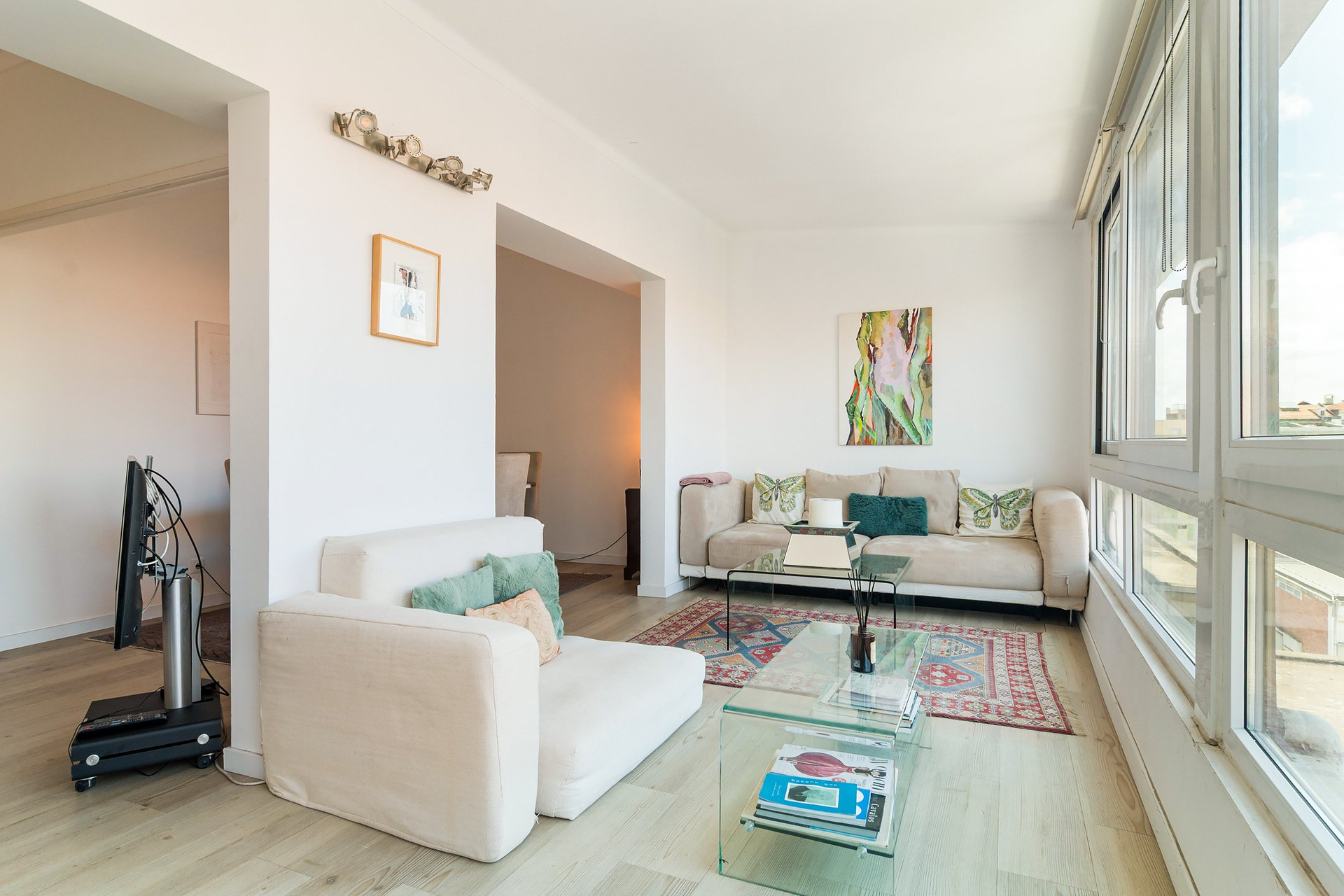 Spacious living room with large windows