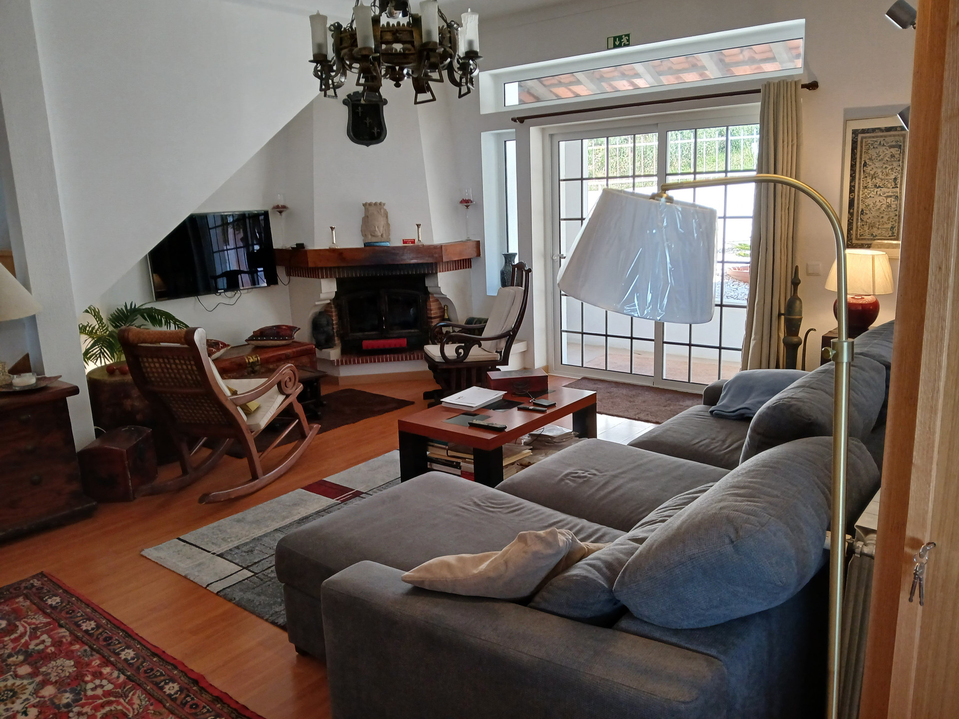 Living room fireplace and sofa