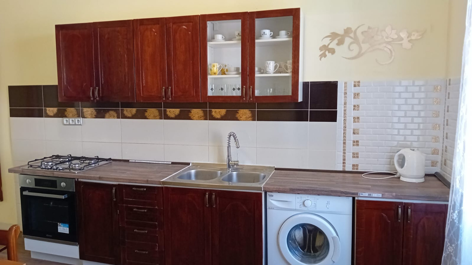 a kitchen - washing machine