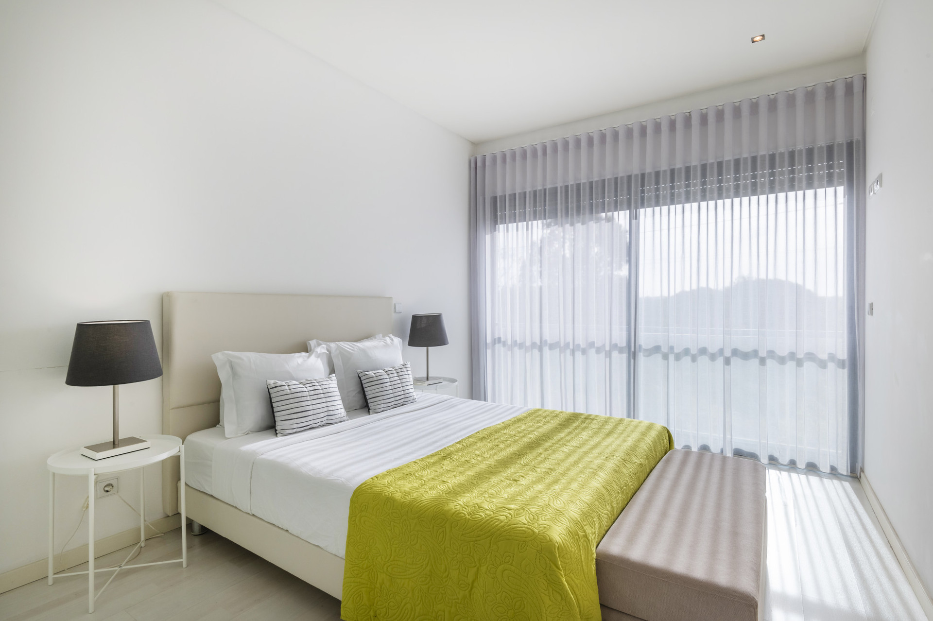 Suite with double bed, wardrobe and AC