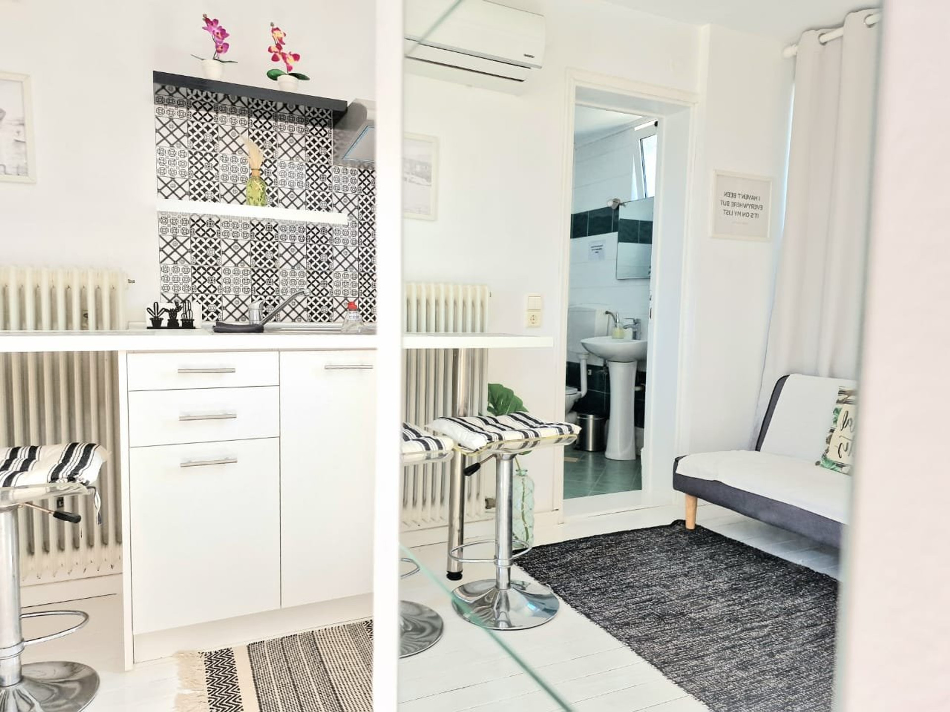 Kitchen area with bar stools