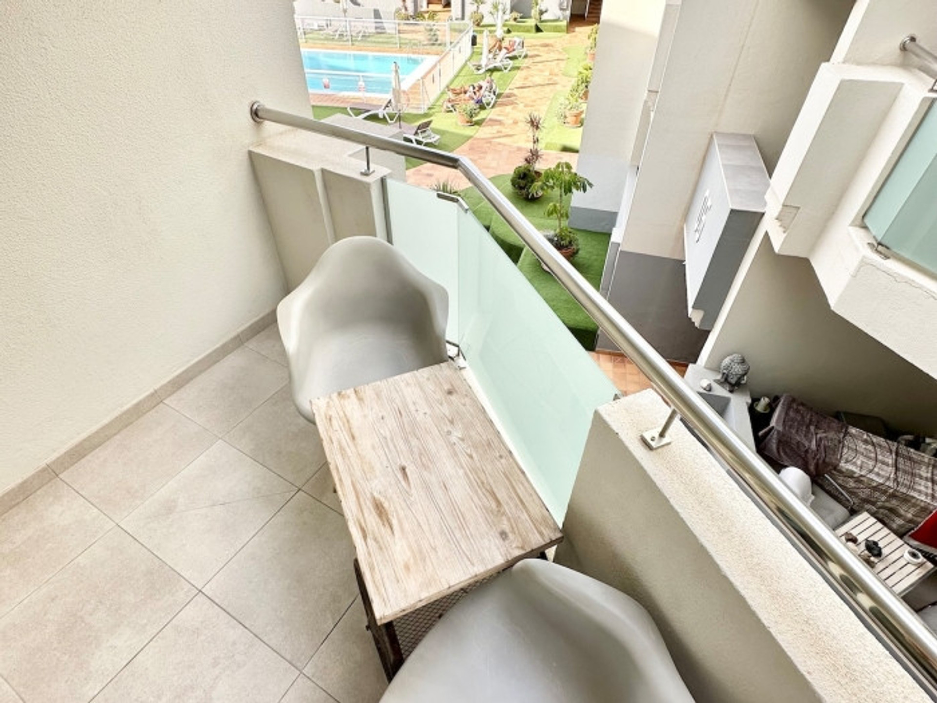 Balcony overlooking pool area