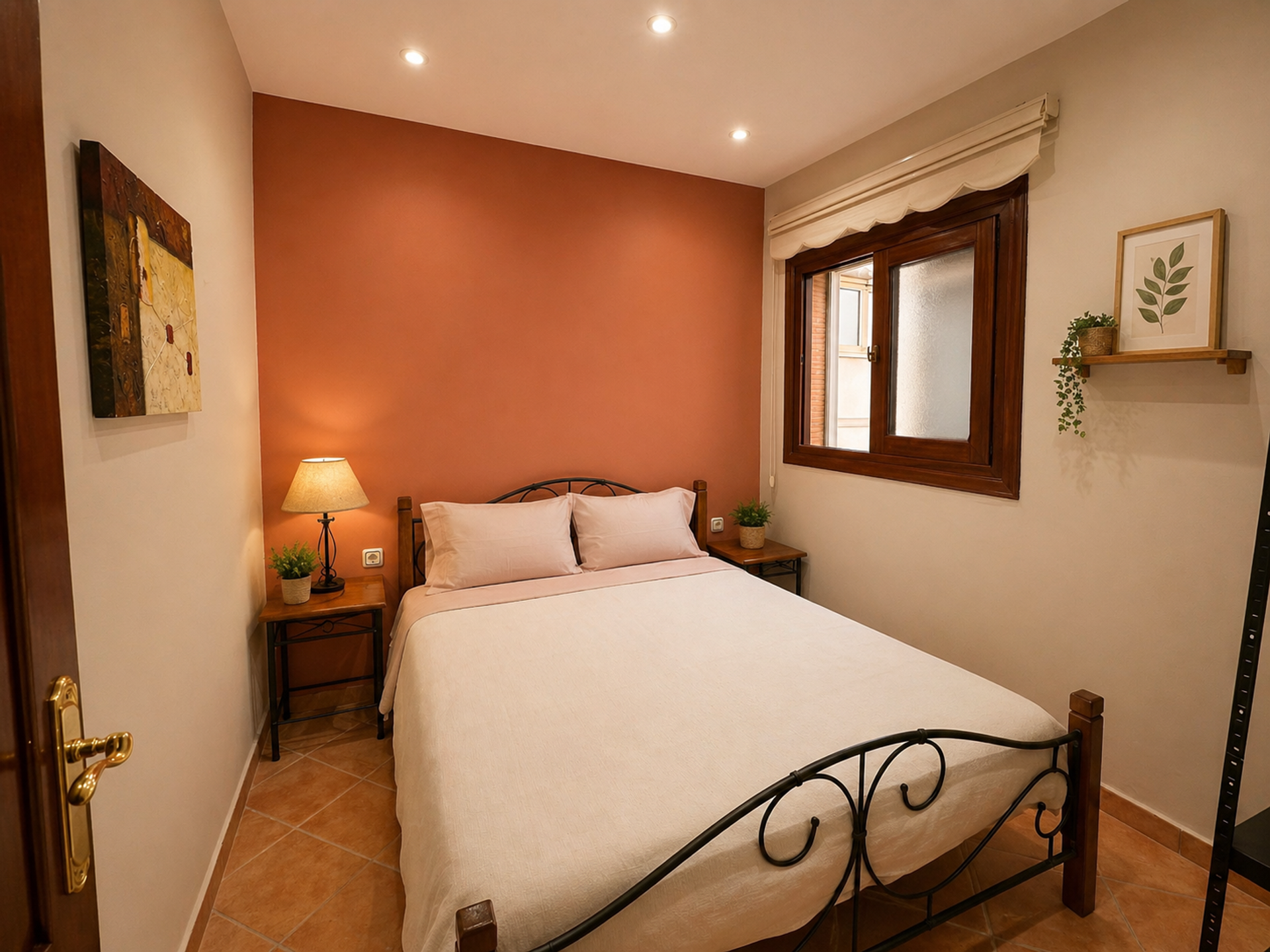 Bedroom with orange accent wall