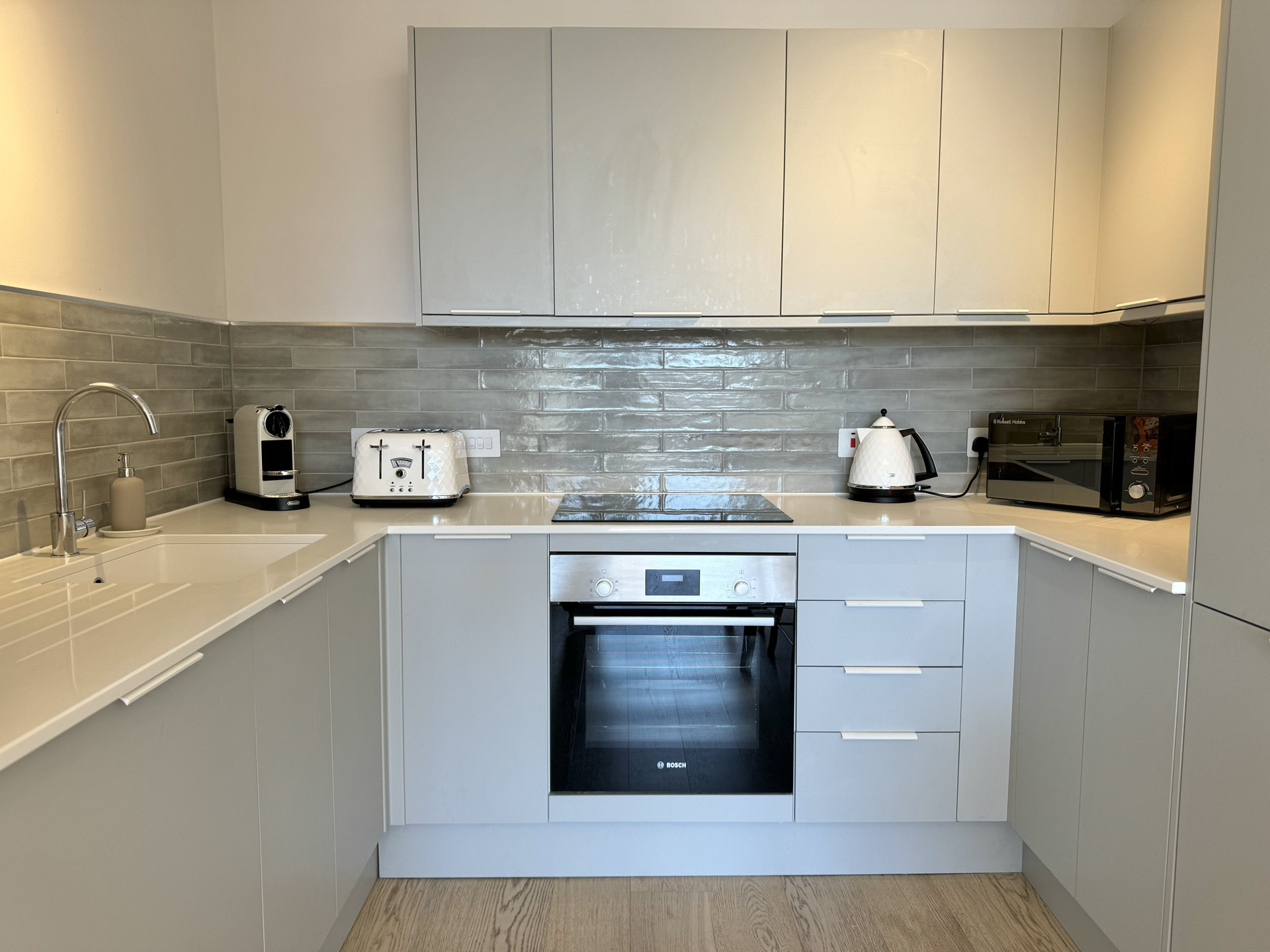 Modern grey kitchen with oven