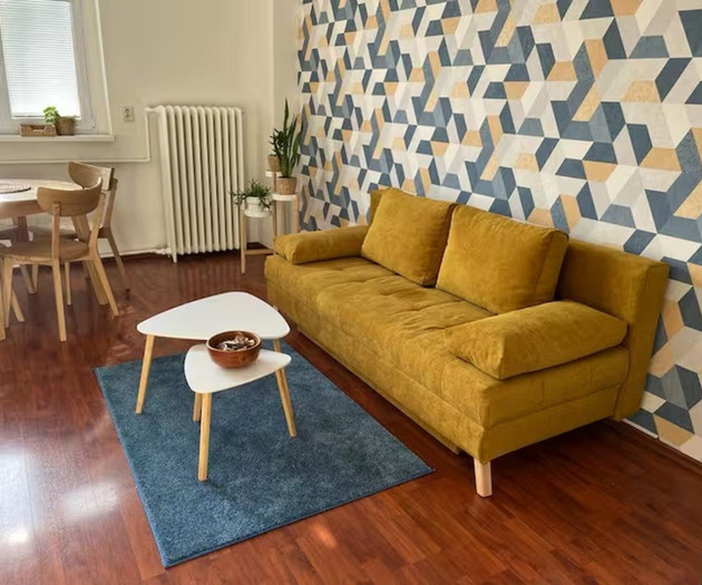Living room with yellow sofa