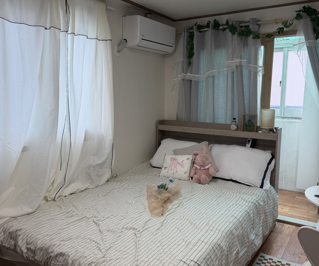Bed with striped bedding