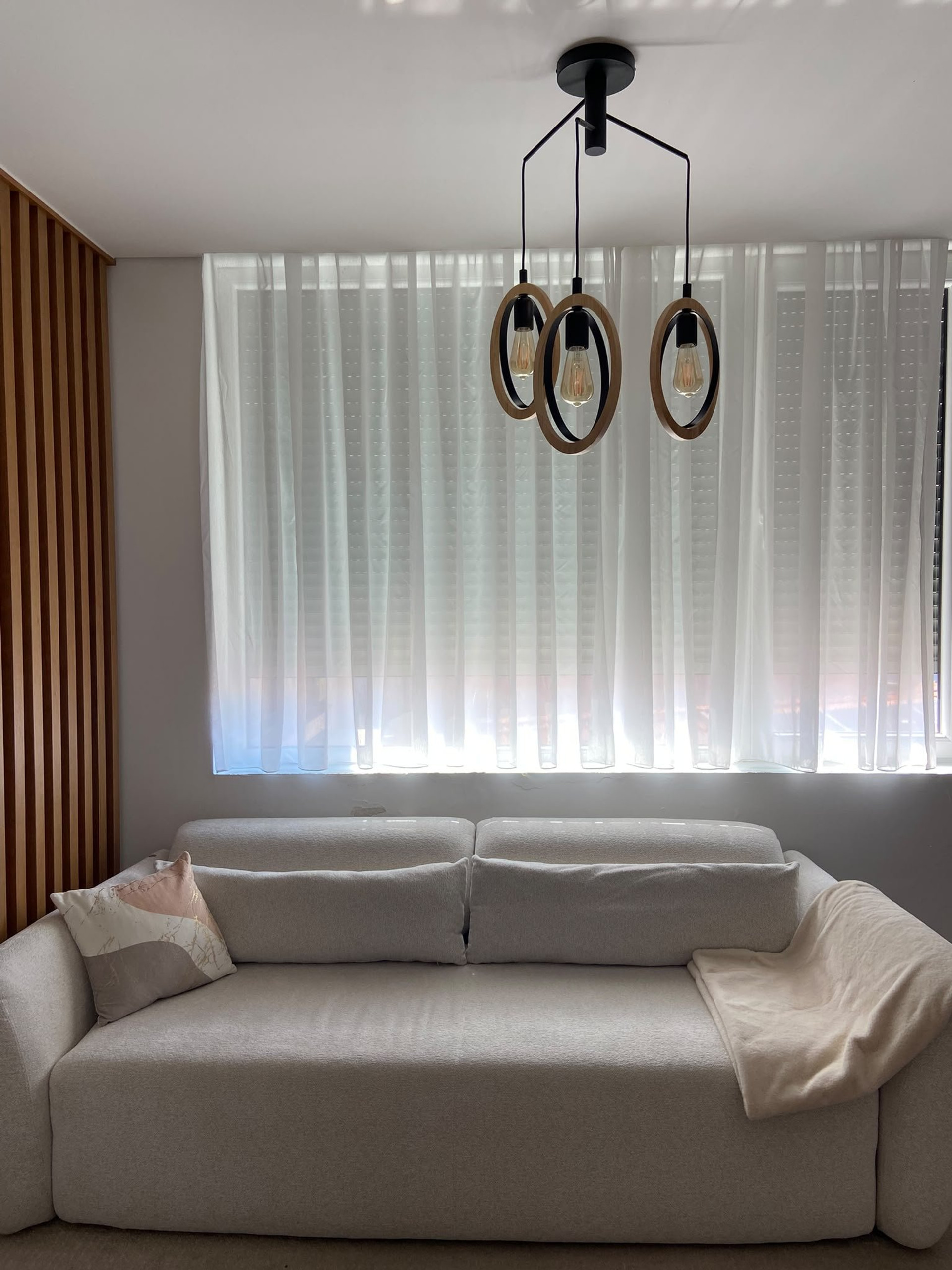 Bright living room with sofa