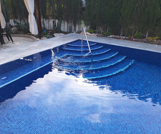 Pool steps with blue tiles