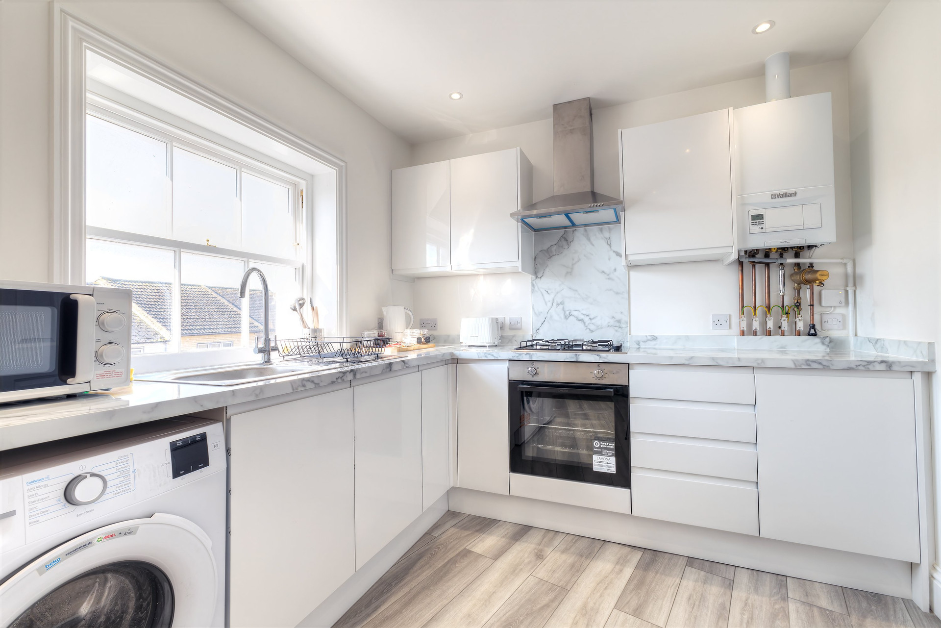 White kitchen with appliances