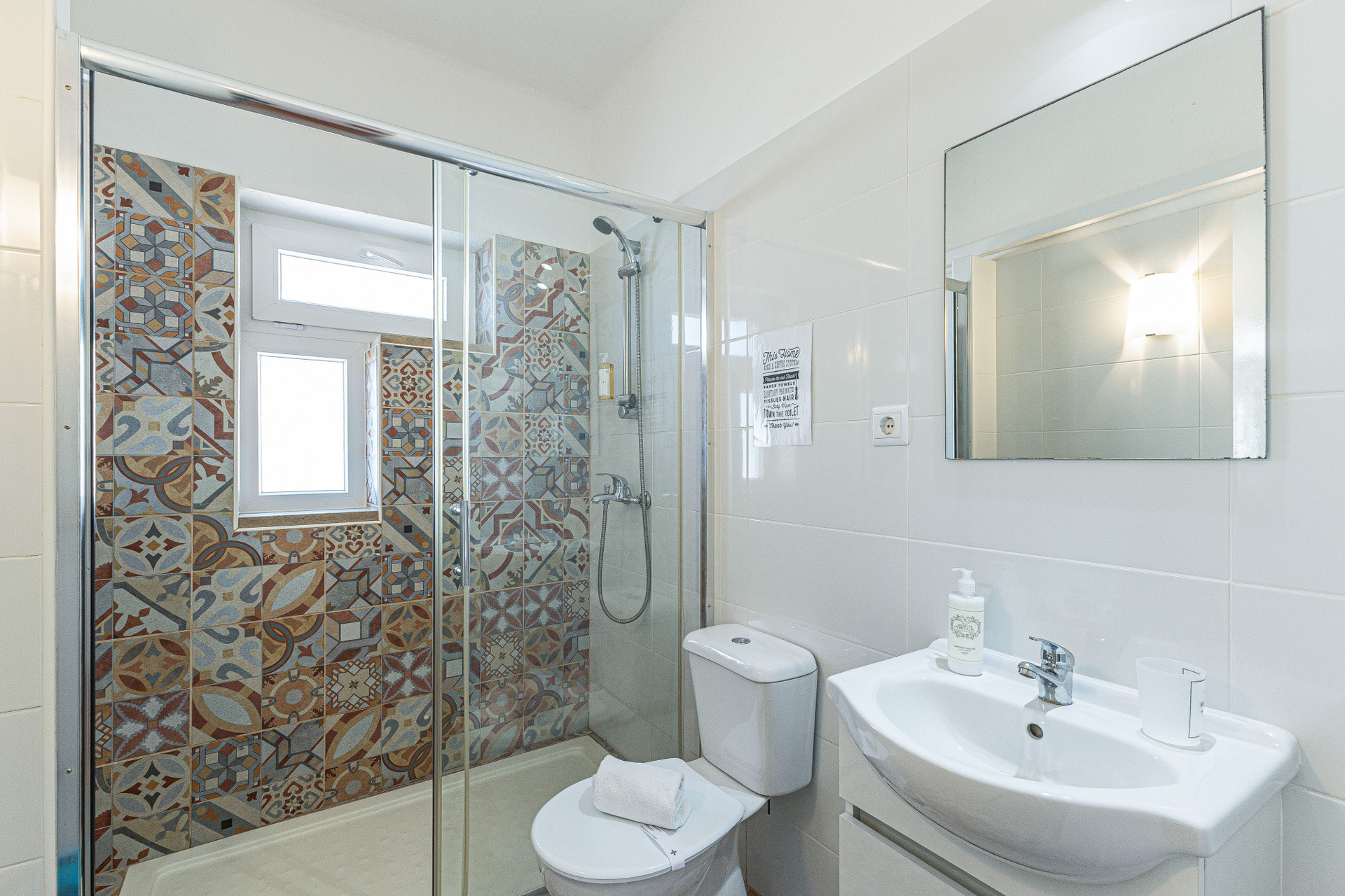 Bathroom with tiled walk-in shower