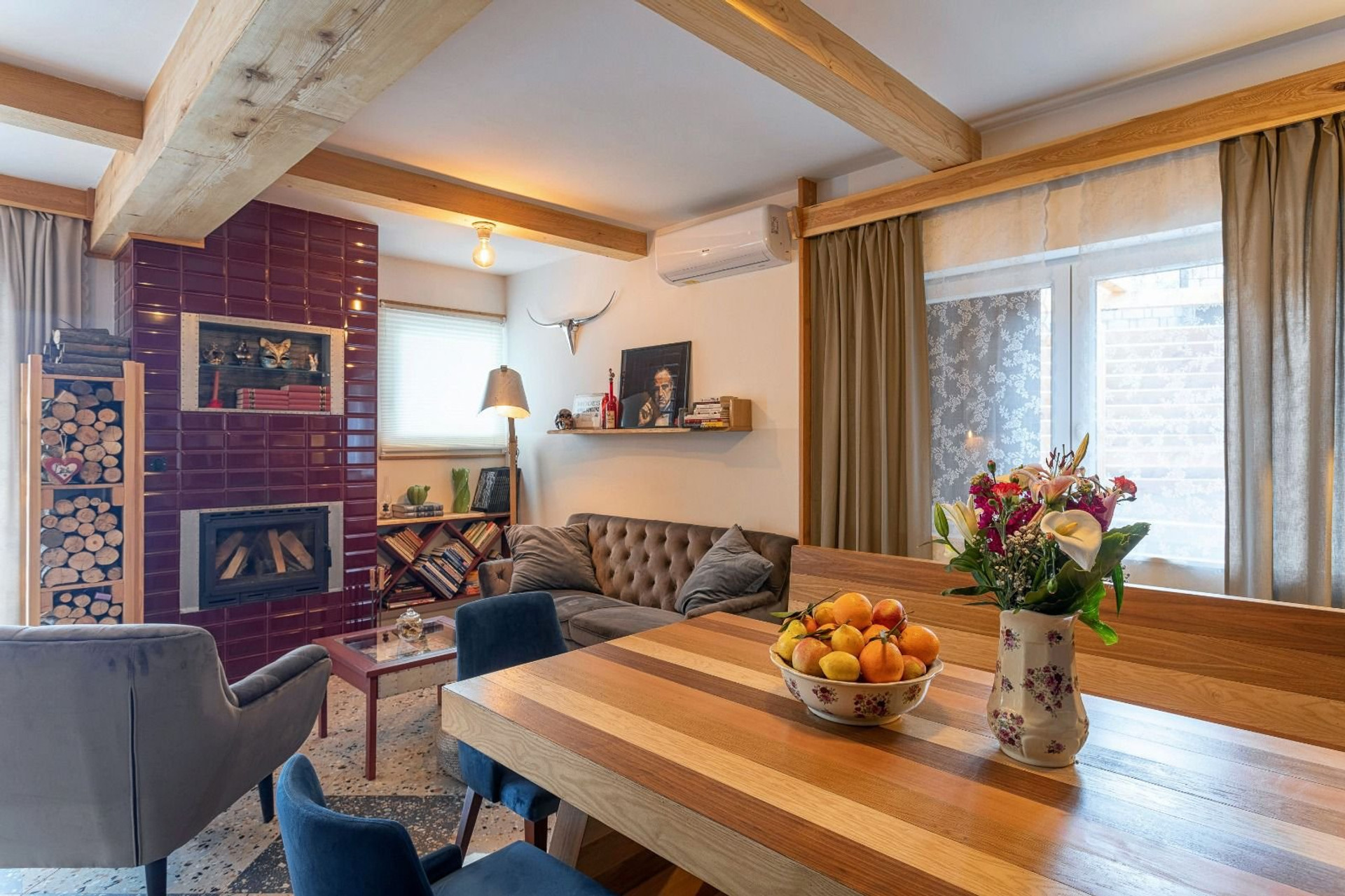 Living room with fireplace and dining table
