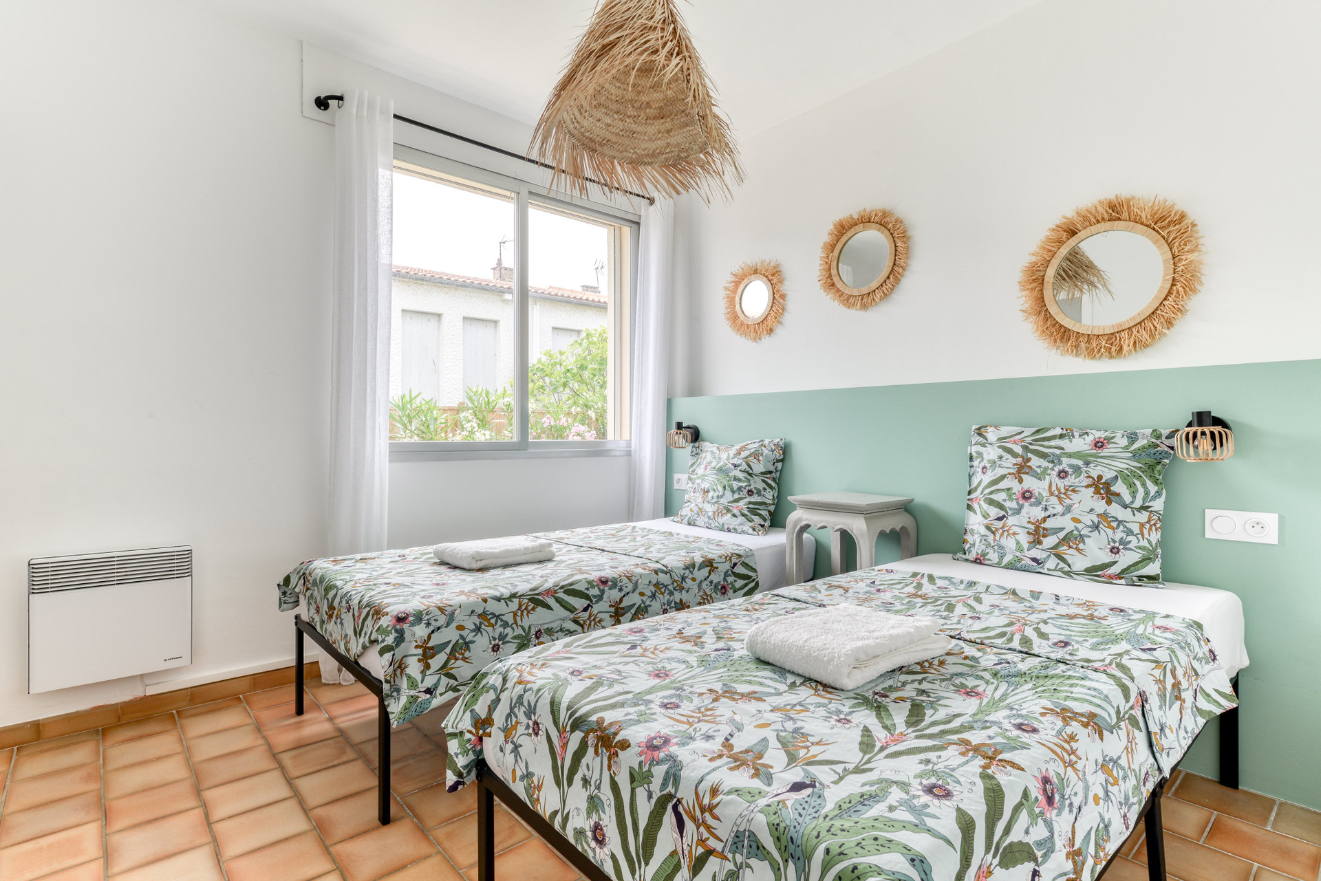 Twin bedroom with floral bedding