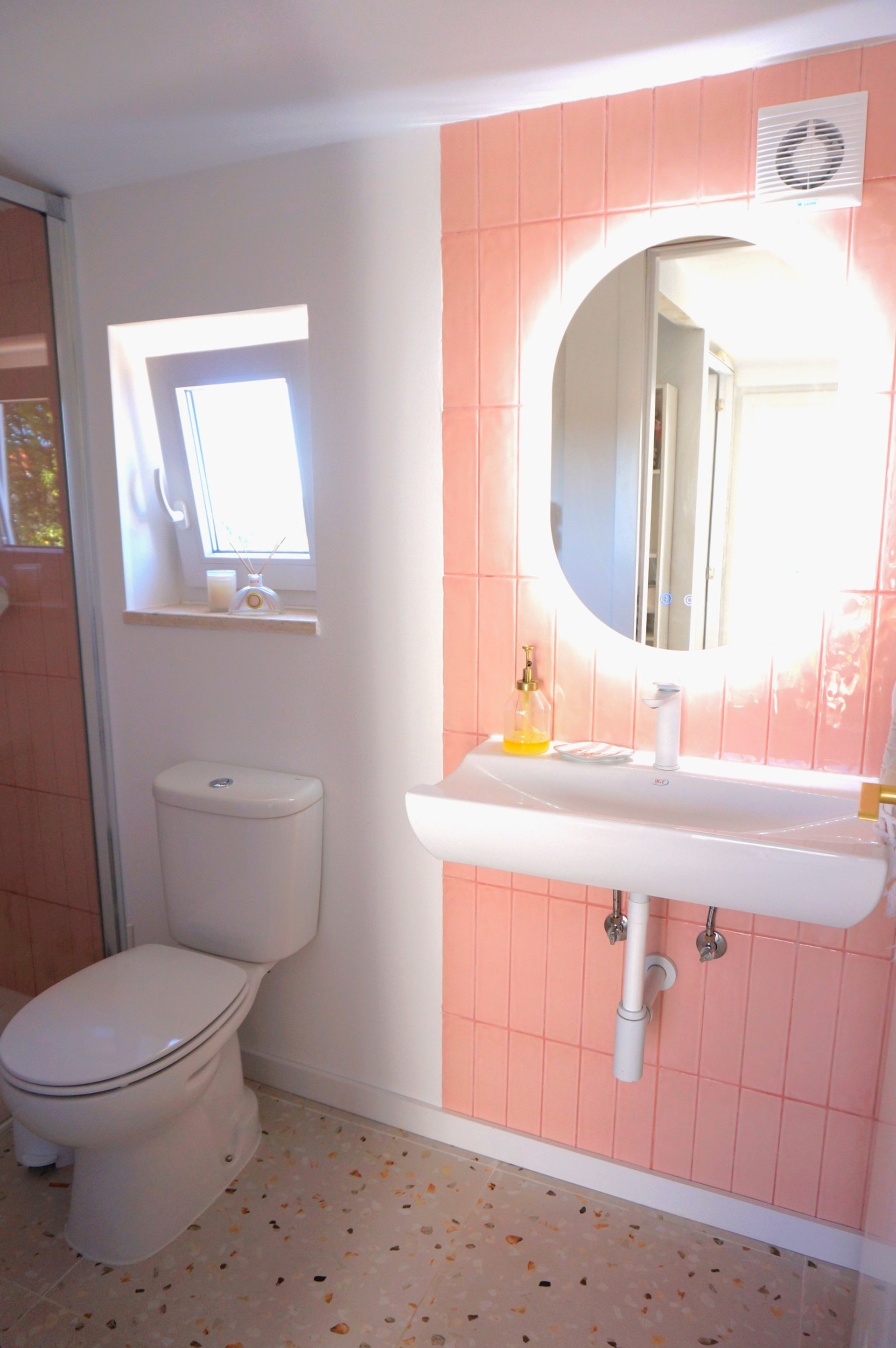 Pink tiled bathroom