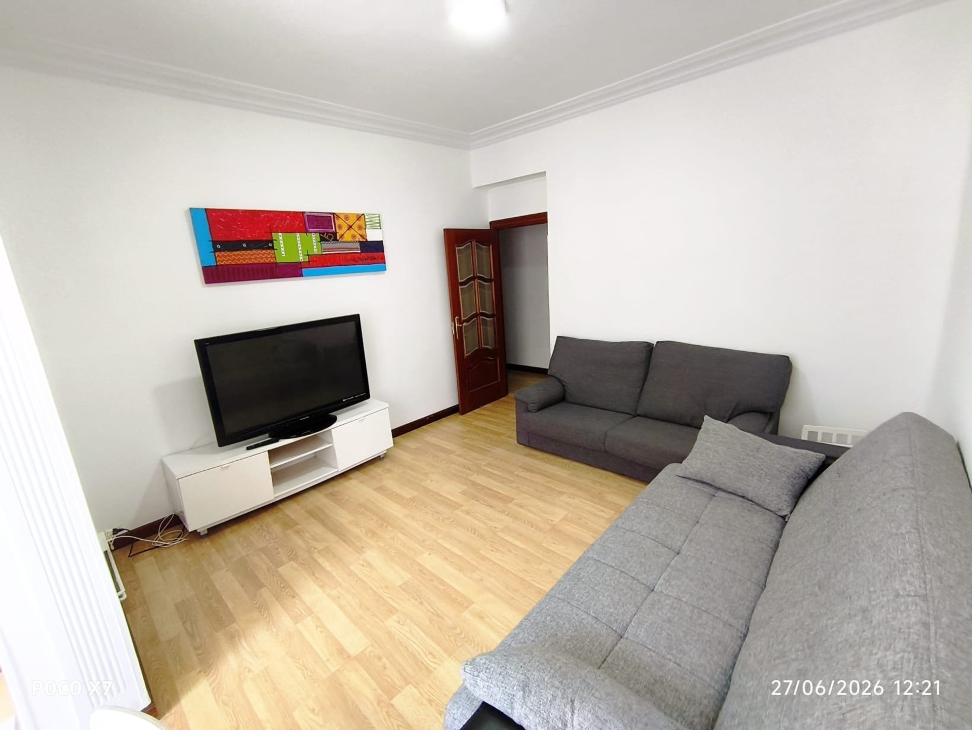 Living room with sofas and TV