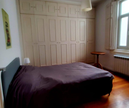 Bedroom in a sunny flat with terrace