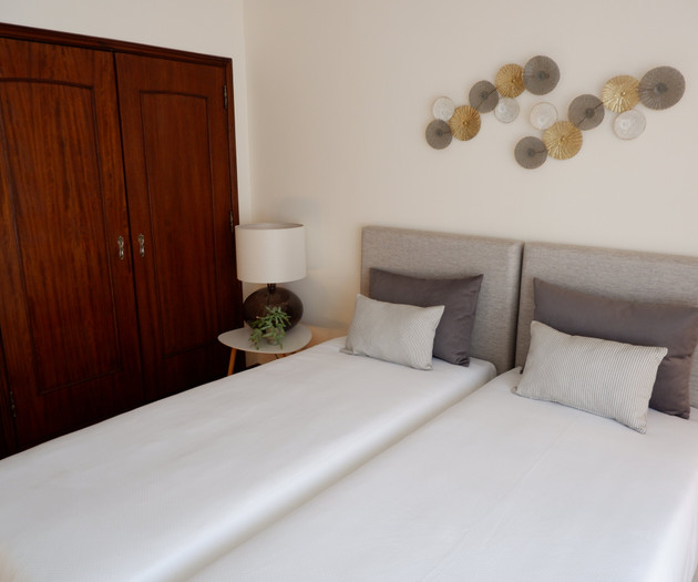 Twin bedroom with wardrobe