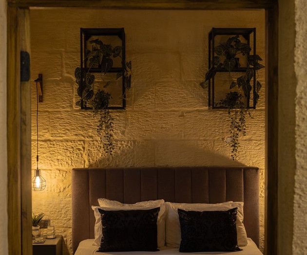 Bed with decorative plant shelves
