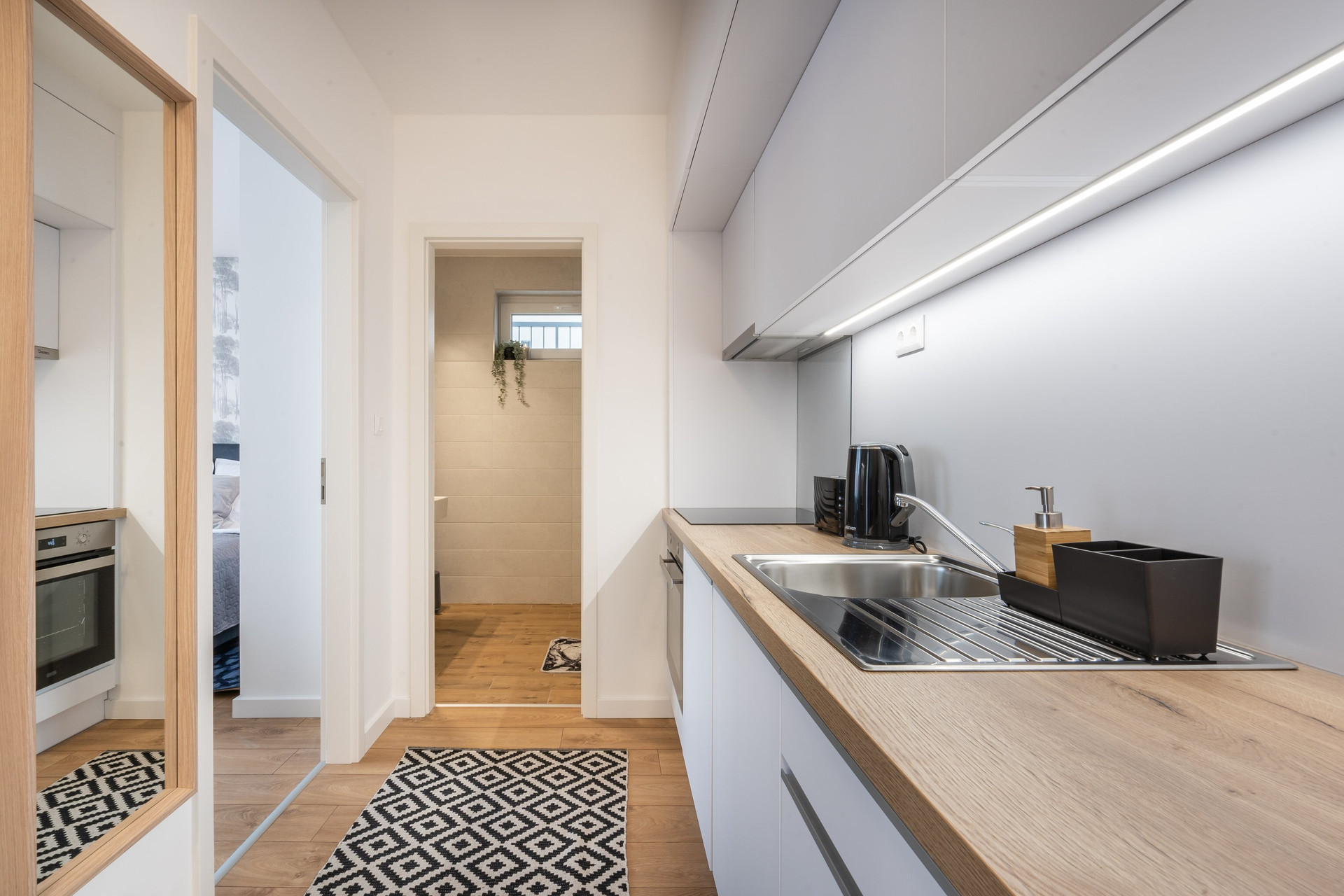 Modern kitchen with hallway view