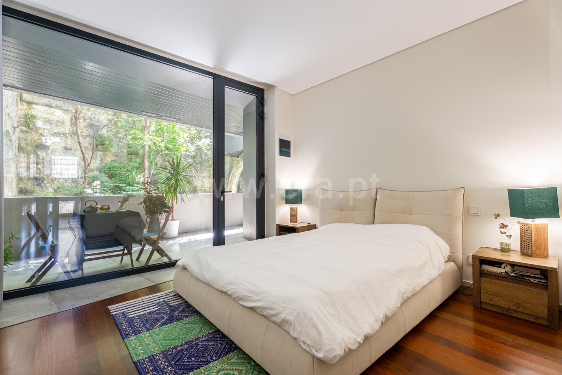 Bright bedroom with garden balcony