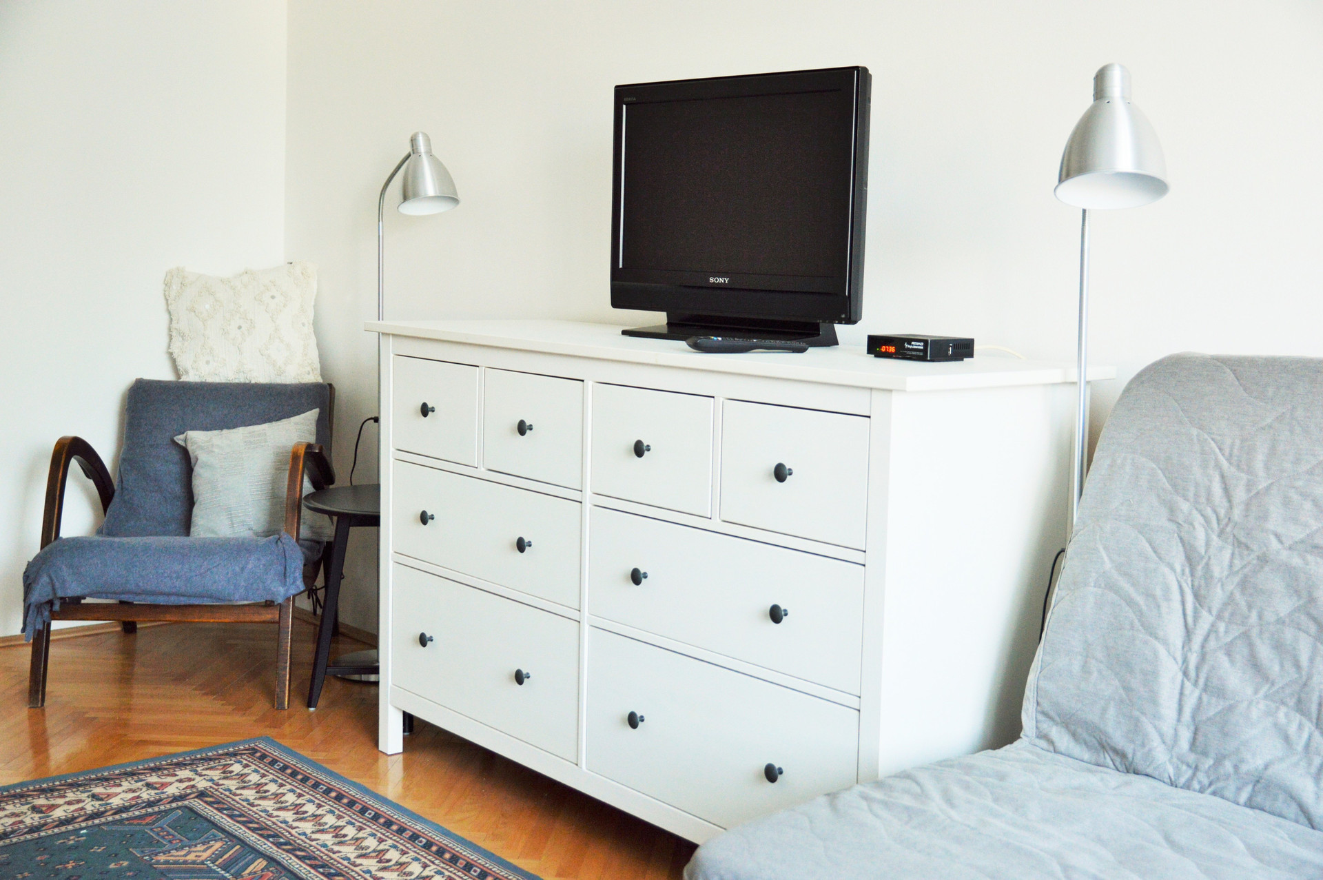 Living area with dresser and TV
