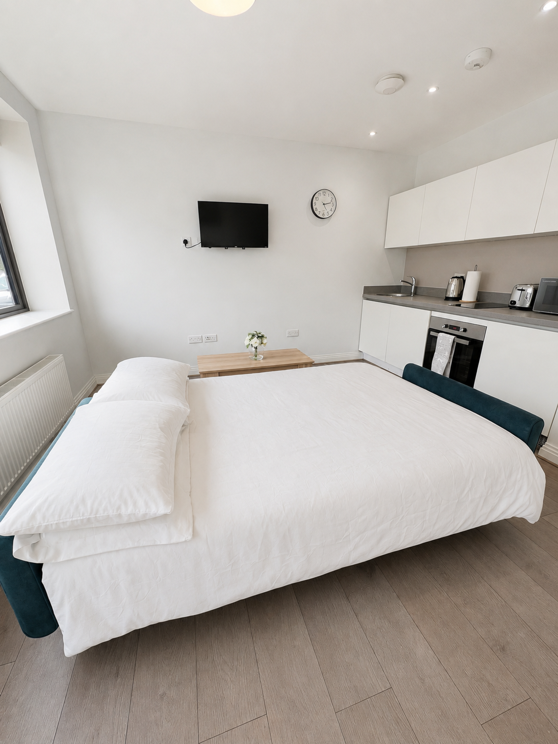 Studio bed with kitchenette