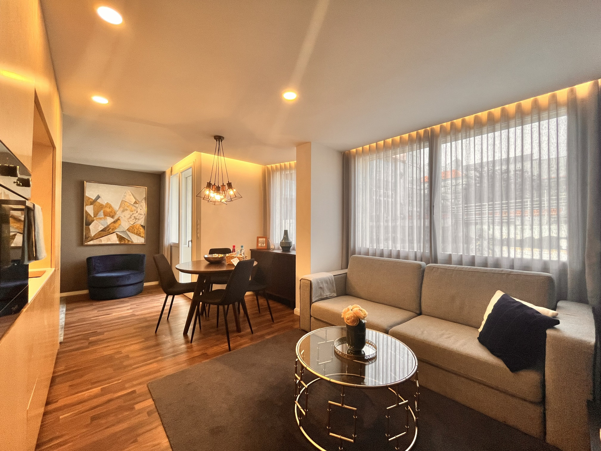 Living room and dinning table with open kitchen