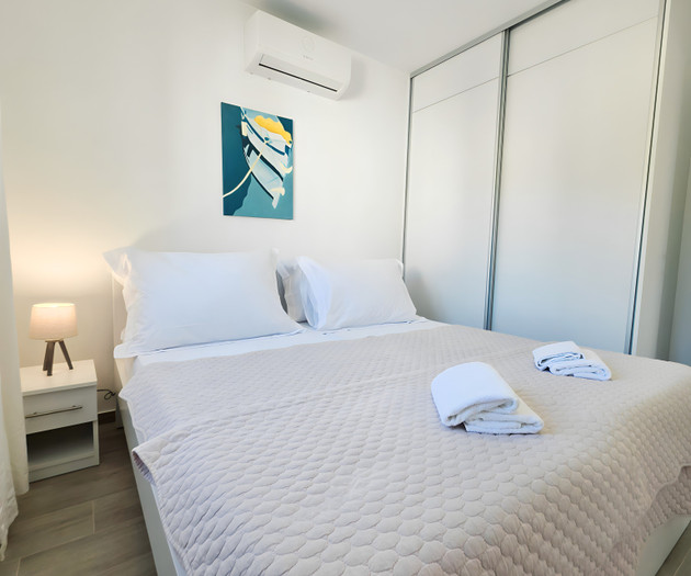 Bedroom with nightstand lamp