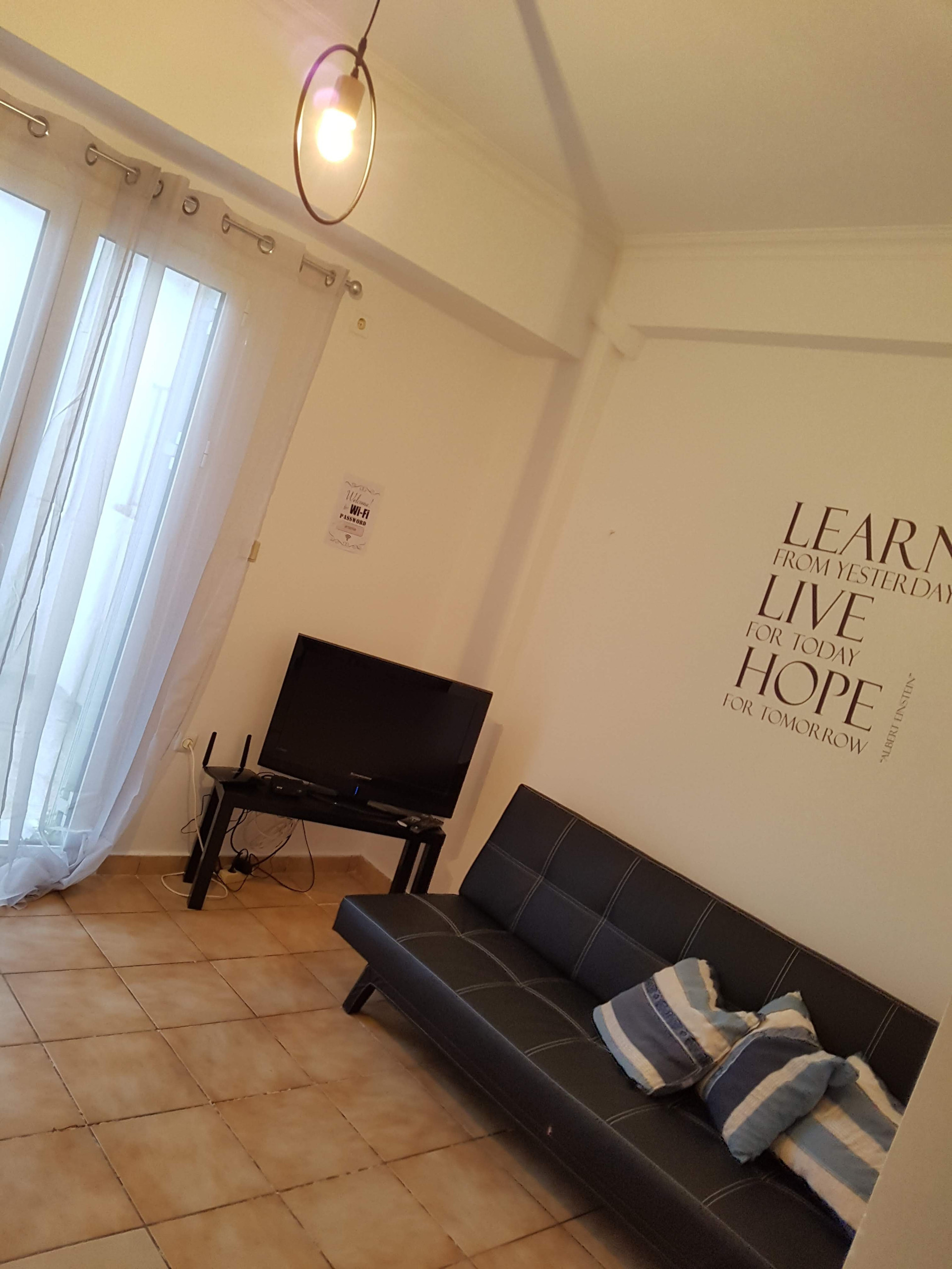 Living room with sofa and TV