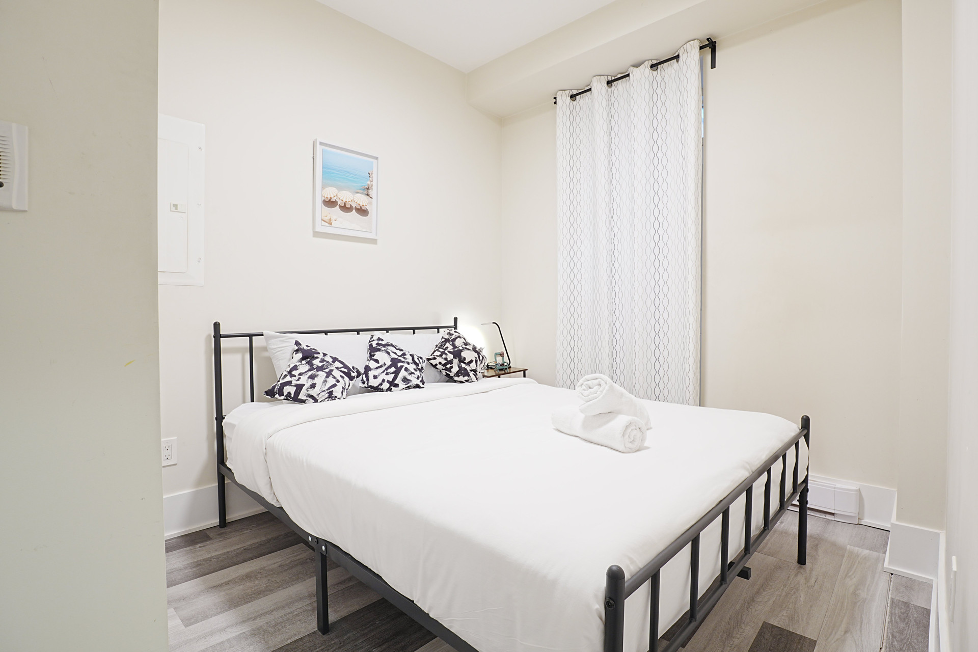 Bedroom with bed and curtains