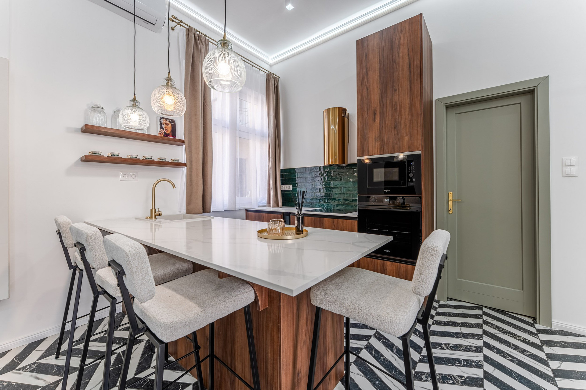 Modern kitchen island with bar stools