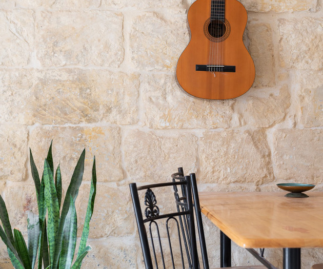 Dining nook with guitar decor